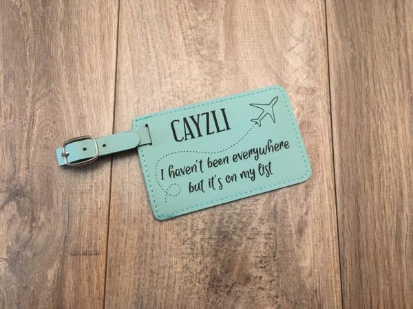 If you're looking for affordable valentine's day gift ideas for travel lovers, then this personalised luggage tag with a travel quote is a great gift.